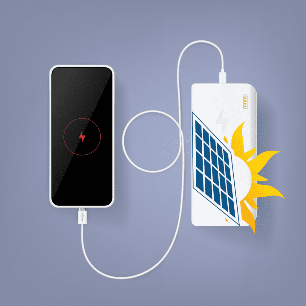 A solar powered charger, charging the mobile phone.