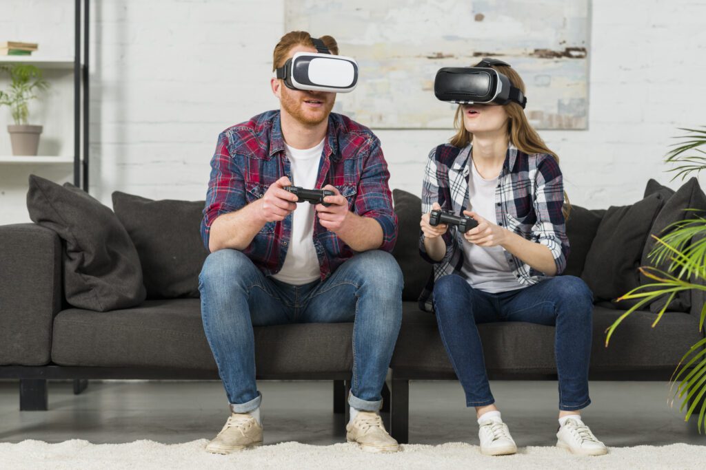 A couple playing game using VR headset